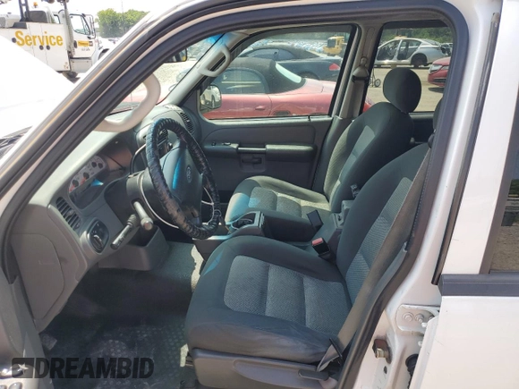 2005 Ford Explorer Sport Trac XLS with VIN 1FMZU67K15UA00686, listed as a Copart auction lot 57952265 with 290,087 mi miles and Clean title. Bid and sale history available at DreamBid. Image 7.