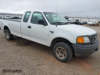 2004 Ford F-150 Heritage XL with VIN 2FTRX18W34CA91703, listed as a IAAI auction lot 41602168 with 223,670 mi miles. Bid and sale history available at carsss.com. Image 1.
