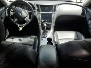 2014 Infiniti Q50 Premium with VIN JN1BV7AP2EM678198, listed as a Copart auction lot 61614325 with 163,943 mi miles and Salvage title. Bid and sale history available at DreamBid. Image 8.