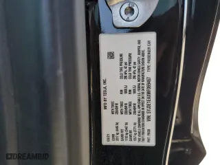 2021 Tesla Model 3 Standard Range Plus with VIN 5YJ3E1EAXMF069467, listed as a Copart auction lot 63273134 with 66,393 mi miles and Salvage Title. Bid and sale history available at carsss.com. Image 14.