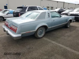 1977 Ford Thunderbird z VIN 7G87S303225, wystawiony jako Copart lot #74216404 z przebiegiem 48 305 mil mil oraz Szkody całkowita. Historia ofert i sprzedaży dostępna na DreamBid. Obrazek 3.