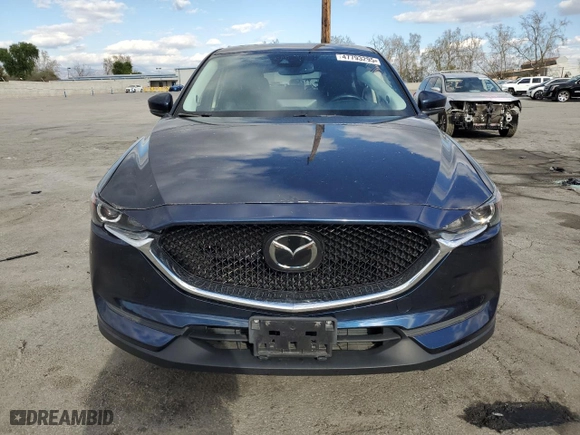 2021 Mazda CX-5 Touring with VIN JM3KFACM7M0410366, listed as a Copart auction lot 47793295 with 88,929 mi miles and Salvage Title. Bid and sale history available at carsss.com. Image 5.