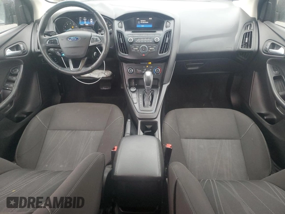 2015 Ford Focus SE with VIN 1FADP3F24FL251916, listed as a Copart auction lot 52800145 with 131,862 mi miles and Salvage Title. Bid and sale history available at DreamBid. Image 8.