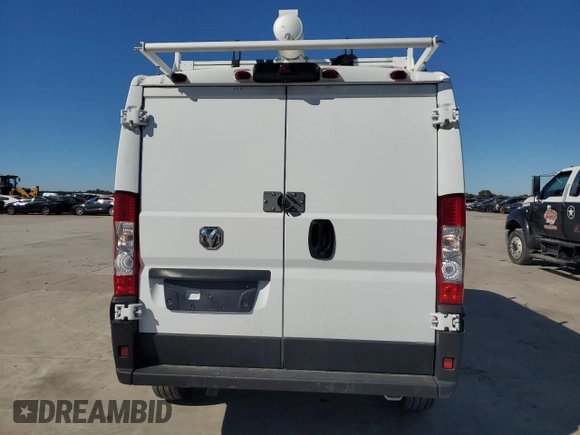 2023 Ram ProMaster Cargo with VIN 3C6LRVVG5PE527224, listed as a Copart auction lot 77179234 with 33,804 mi miles and Salvage Title. Bid and sale history available at DreamBid. Image 6.