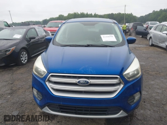 2017 Ford Escape SE z VIN 1FMCU0GD0HUD03757, wystawiony jako IAAI lot #42410990 z przebiegiem 188 884 mil mil oraz . Historia ofert i sprzedaży dostępna na DreamBid. Obrazek 6.