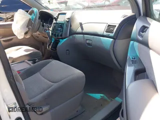 2010 Toyota Sienna CE with VIN 5TDKK4CC4AS293772, listed as a IAAI auction lot 39408854 with 118,238 mi miles. Bid and sale history available at carsss.com. Image 5.