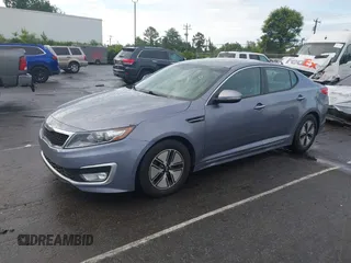 2011 Kia Optima EX Hybrid z VIN KNAGM4AD8B5002951, wystawiony jako IAAI lot #42462401 z przebiegiem 198 079 mil mil oraz . Historia ofert i sprzedaży dostępna na DreamBid. Obrazek 2.