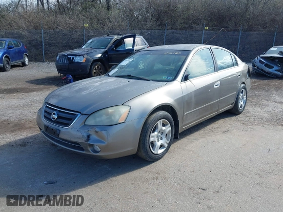 2002 Nissan Altima S with VIN 1N4AL11D92C256180, listed as a IAAI auction lot 41880101 with 112,228 mi miles. Bid and sale history available at carsss.com. Image 12.