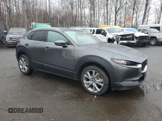 2022 Mazda CX-30 S Premium with VIN 3MVDMBDLXNM445466, listed as a Copart auction lot 51820105 with 65,417 mi miles and Salvage title. Bid and sale history available at DreamBid. Image 4.