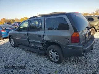2006 GMC Envoy SLE with VIN 1GKET16S166171992, listed as a Copart auction lot 76676894 with 203,713 mi miles and Salvage Title. Bid and sale history available at DreamBid. Image 2.