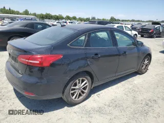 2018 Ford Focus SE with VIN 1FADP3FE8JL205699, listed as a Copart auction lot 63300795 with 128,877 mi miles and Clean title. Bid and sale history available at DreamBid. Image 3.