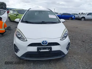 2018 Toyota Prius One with VIN JTDKDTB35J1615449, listed as a IAAI auction lot 42041928 with 59,870 mi miles and . Bid and sale history available at DreamBid. Image 12.