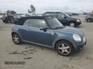 2010 MINI Convertible with VIN WMWMR3C52ATU98506, listed as a Copart auction lot 47706195 with 92,804 mi miles and Clean Title. Bid and sale history available at DreamBid. Image 4.