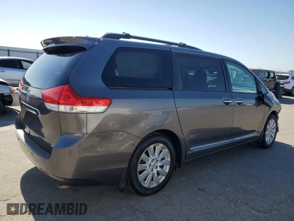 2014 Toyota Sienna XLE z VIN 5TDYK3DC7ES452163, wystawiony jako Copart lot #57534605 z przebiegiem 174 794 mil mil oraz Szkoda całkowita • Salvage title. Historia ofert i sprzedaży dostępna na DreamBid. Obrazek 3.