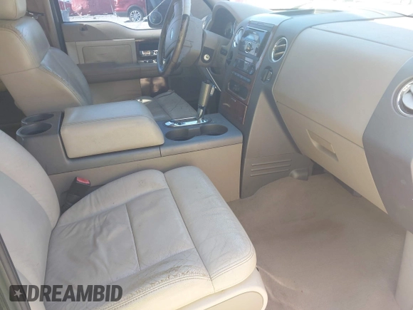2004 Ford F-150 XLT with VIN 1FTPW12504KD06640, listed as a IAAI auction lot 42293219 with 182,161 mi miles and . Bid and sale history available at DreamBid. Image 5.