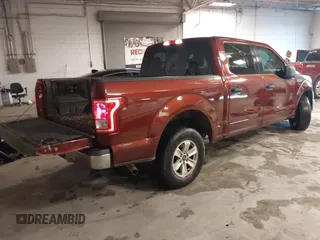 2015 Ford F-150 XLT with VIN 1FTEW1C84FKD05672, listed as a IAAI auction lot 41366154 with 119,504 mi miles and . Bid and sale history available at carsss.com. Image 4.