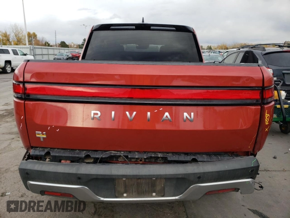 2023 Rivian R1T Adventure with VIN 7FCTGAAA2PN026211, listed as a Copart auction lot 77705414 with Not Provided miles and Salvage Title. Bid and sale history available at DreamBid. Image 6.