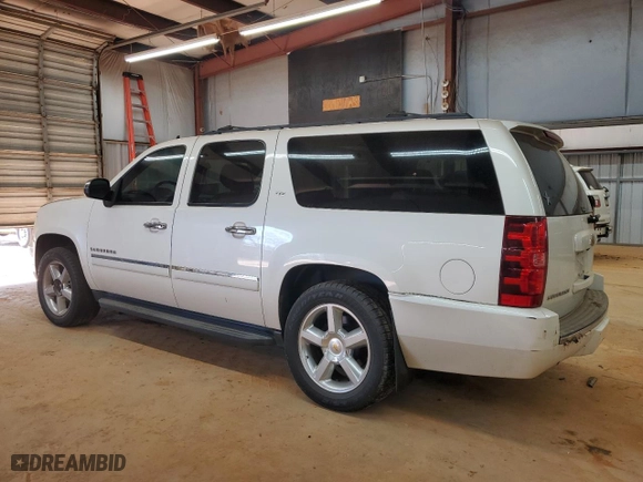 2014 Chevrolet Suburban LTZ with VIN 1GNSCKE0XER127997, listed as a Copart auction lot 42411525 with 228,690 mi miles and Salvage Title. Bid and sale history available at carsss.com. Image 2.