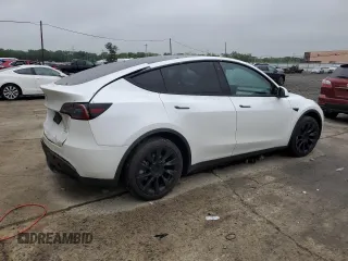 2022 Tesla Model Y Long Range z VIN 7SAYGDEE5NA016276, wystawiony jako Copart lot #55942355 z przebiegiem 14 085 mil mil oraz Szkody całkowita. Historia ofert i sprzedaży dostępna na DreamBid. Obrazek 3.