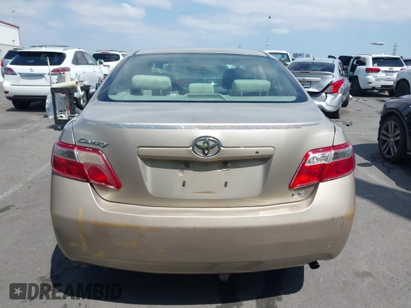 2007 Toyota Camry CE with VIN 4T1BE46KX7U716414, listed as a IAAI auction lot 42116250 with 104,298 mi miles and . Bid and sale history available at DreamBid. Image 16.