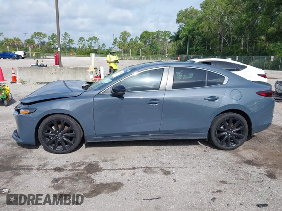 2024 Mazda 3 S Carbon Edition with VIN 3MZBPBCM2RM403824, listed as a IAAI auction lot 42612315 with 8,261 mi miles and . Bid and sale history available at DreamBid. Image 15.