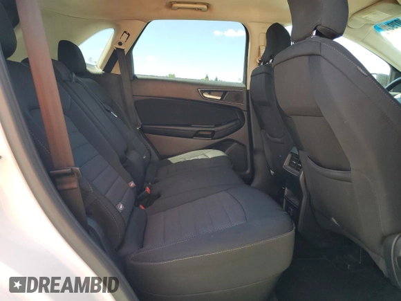 2015 Ford Edge SE z VIN 2FMTK3G86FBC35249, wystawiony jako Copart lot #56410795 z przebiegiem 107 974 mil mil oraz Szkoda całkowita • Salvage title. Historia ofert i sprzedaży dostępna na DreamBid. Obrazek 11.