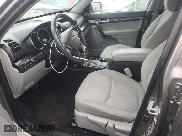 2012 Kia Sorento LX with VIN 5XYKTCA69CG256544, listed as a Copart auction lot 85510044 with 167,395 mi miles and Salvage Title. Bid and sale history available at DreamBid. Image 7.