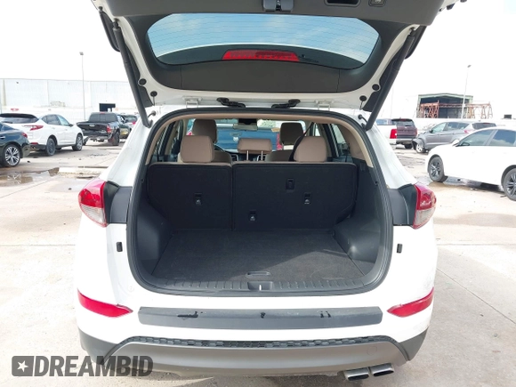2016 Hyundai Tucson Limited with VIN KM8J33A21GU079870, listed as a IAAI auction lot 42074089 with 78,328 mi miles. Bid and sale history available at carsss.com. Image 17.