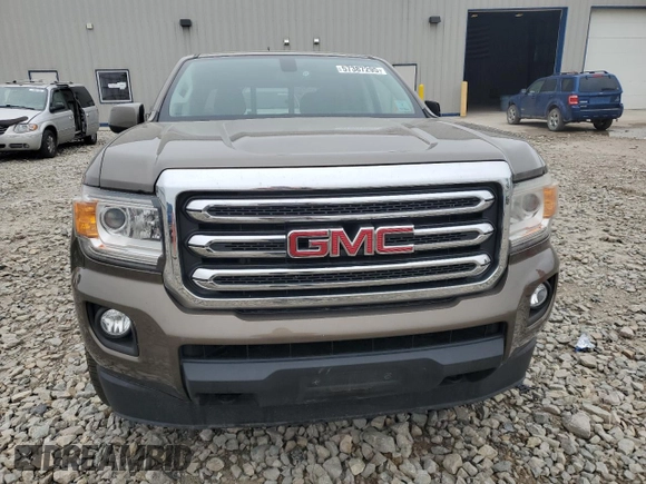 2016 GMC Canyon 4WD SLE z VIN 1GTG6CE38G1303839, wystawiony jako Copart lot #57387295 z przebiegiem 87 945 mil mil oraz Nie do naprawy. Historia ofert i sprzedaży dostępna na DreamBid. Obrazek 5.