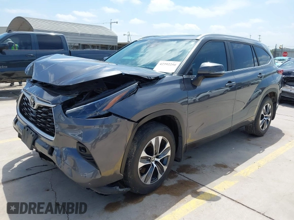 2023 Toyota Highlander L with VIN 5TDKDRAH7PS007332, listed as a IAAI auction lot 42392250 with 51,943 mi miles and . Bid and sale history available at DreamBid. Image 2.