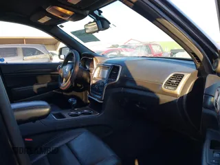 2014 Jeep Grand Cherokee Laredo with VIN 1C4RJEAG3EC218128, listed as a IAAI auction lot 40951611 with 119,596 mi miles and . Bid and sale history available at DreamBid. Image 5.
