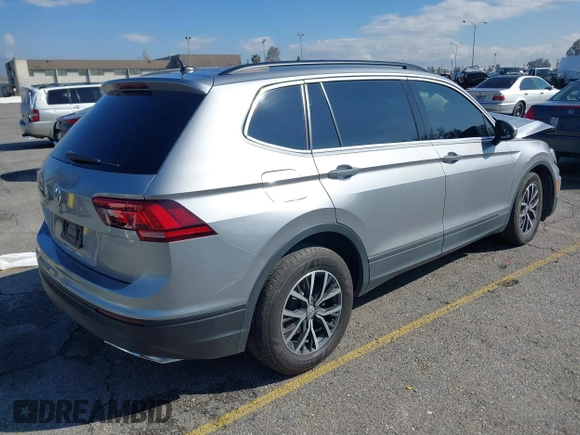 2021 Volkswagen Tiguan S with VIN 3VV1B7AX6MM131036, listed as a IAAI auction lot 41742604 with 55,155 mi miles and . Bid and sale history available at DreamBid. Image 4.