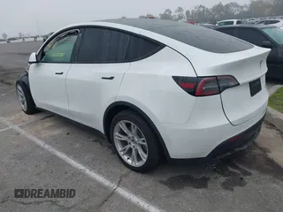 2022 Tesla Model Y Long Range z VIN 7SAYGDEE4NF315356, wystawiony jako IAAI lot #41571151 z przebiegiem 1 056 mil mil oraz . Historia ofert i sprzedaży dostępna na DreamBid. Obrazek 3.