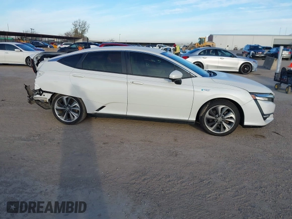 2018 Honda Clarity z VIN JHMZC5F14JC002263, wystawiony jako IAAI lot #41353651 z przebiegiem 153 401 mil mil oraz . Historia ofert i sprzedaży dostępna na DreamBid. Obrazek 13.