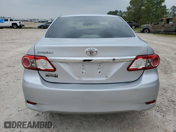 2013 Toyota Corolla L with VIN JTDBU4EE7DJ116188, listed as a Copart auction lot 51172415 with 127,065 mi miles and Salvage Title. Bid and sale history available at DreamBid. Image 6.