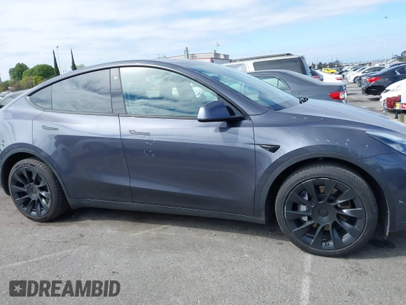 2021 Tesla Model Y Long Range with VIN 5YJYGDEE6MF209034, listed as a IAAI auction lot 41896238 with 53,401 mi miles. Bid and sale history available at carsss.com. Image 14.