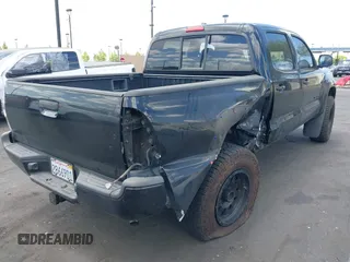 2011 Toyota Tacoma with VIN 3TMLU4EN5BM075967, listed as a IAAI auction lot 42228409 with 158,241 mi miles and . Bid and sale history available at DreamBid. Image 4.