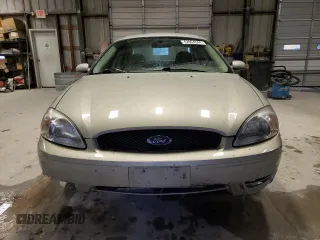 2004 Ford Taurus SE with VIN 1FAFP53U74G122231, listed as a Copart auction lot 42904044 with 116,851 mi miles and Salvage Title. Bid and sale history available at DreamBid. Image 5.
