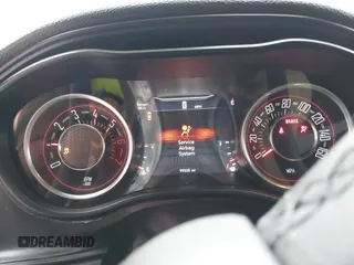 2015 Dodge Challenger R/T with VIN 2C3CDZATXFH712765, listed as a IAAI auction lot 41817210 with 99,535 mi miles and . Bid and sale history available at DreamBid. Image 7.
