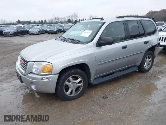 2006 GMC Envoy SLT with VIN 1GKDT13SX62342147, listed as a IAAI auction lot 40873738 with 159,092 mi miles. Bid and sale history available at carsss.com. Image 2.