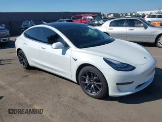 2020 Tesla Model 3 Long Range with VIN 5YJ3E1EB8LF741615, listed as a IAAI auction lot 41658252 with 20,251 mi miles. Bid and sale history available at carsss.com. Image 1.