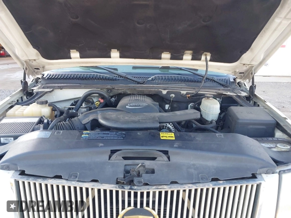 2004 Cadillac Escalade z VIN 1GYEC63T64R231552, wystawiony jako IAAI lot #41428401 z przebiegiem 275 724 mil mil oraz . Historia ofert i sprzedaży dostępna na DreamBid. Obrazek 10.