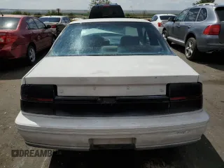 1996 Chevrolet Beretta z VIN 1G1LV1544TY111262, wystawiony jako Copart lot #66693544 z przebiegiem 160 485 mil mil oraz Szkoda całkowita • Salvage title. Historia ofert i sprzedaży dostępna na DreamBid. Obrazek 6.