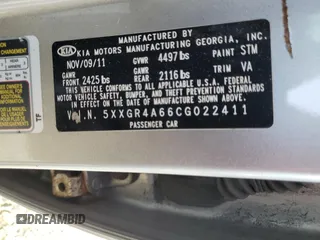 2012 Kia Optima SX with VIN 5XXGR4A66CG022411, listed as a Copart auction lot 49987235 with 219,814 mi miles and Salvage Title. Bid and sale history available at carsss.com. Image 12.
