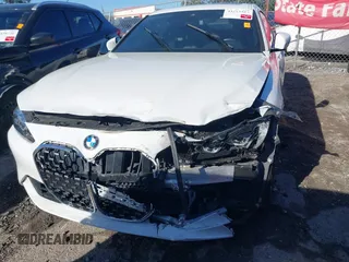 2021 BMW 4 Series 430i with VIN WBA53AP06MCG36919, listed as a IAAI auction lot 41863554 with 33,556 mi miles and . Bid and sale history available at DreamBid. Image 6.