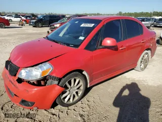 2009 Suzuki SX4 Touring Pkg 2 with VIN JS2YC417596201244, listed as a Copart auction lot 46684265 with 146,543 mi miles and Salvage Title. Bid and sale history available at carsss.com. Image 1.