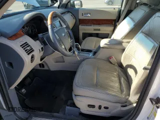 2009 Ford Flex Limited z VIN 2FMEK63C69BA03324, wystawiony jako Copart lot #55831135 z przebiegiem 202 031 mil mil oraz Czysty tytuł • Clean title. Historia ofert i sprzedaży dostępna na DreamBid. Obrazek 7.