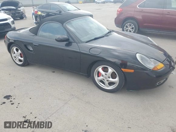 1998 Porsche Boxster с VIN WP0CA2982WU620882, выставлен на аукционе Copart как лот 50950515 с пробегом Не указан миль и Списание • Salvage title. История ставок и продаж доступна на DreamBid. Изображение 4.