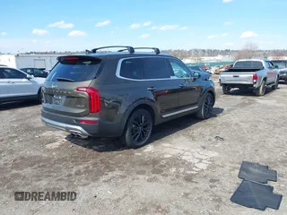 2021 Kia Telluride SX with VIN 5XYP5DHC2MG162119, listed as a IAAI auction lot 41881250 with 112,024 mi miles and . Bid and sale history available at DreamBid. Image 4.