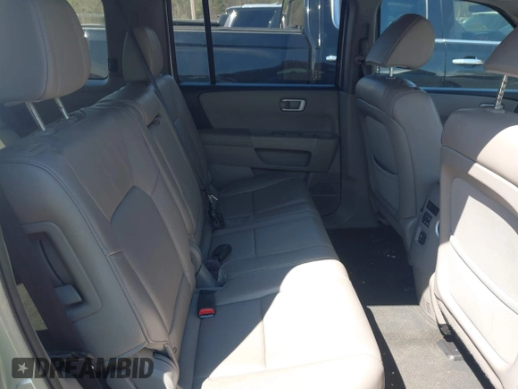 2013 Honda Pilot EX-L with VIN 5FNYF3H59DB022797, listed as a IAAI auction lot 41880675 with 206,359 mi miles and . Bid and sale history available at DreamBid. Image 8.